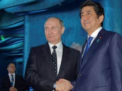 Japan PM Urges Vladimir Putin To Work Together To Resolve Island Dispute