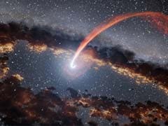When Galaxies Crash, Black Holes Devour Stars