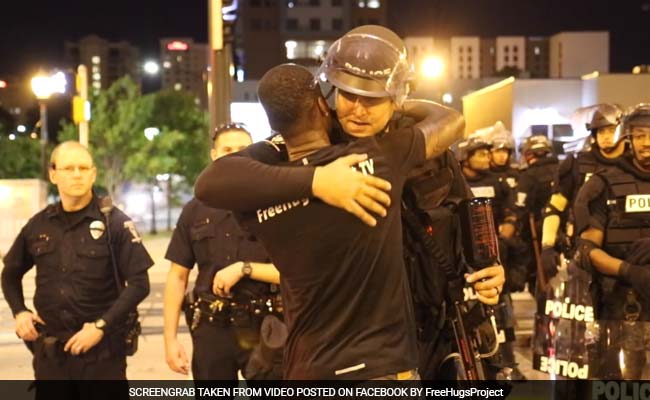 Peace Activist Tries To Calm Charlotte Protests With Free Hugs