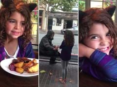 Little Girl Giving Her Food To A Homeless Man Is Winning The Internet