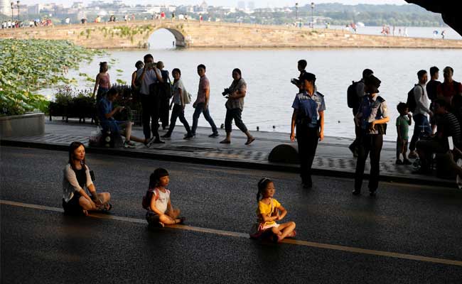 Selfies And Silence As China Shuts Down G20 Host City