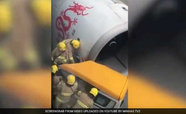 Passenger Plane Collides With Van At Hong Kong Airport