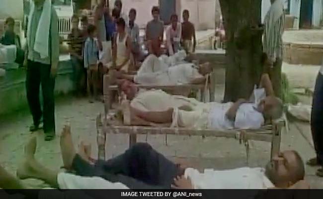 Short Of Hospital Beds, Patients Treated In The Open, Bottles Strung From Trees