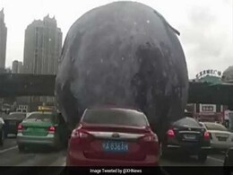 Nothing To See Here, Just A Moon Balloon Rolling Down Streets In China Nothing To See Here, Just A Moon Balloon Rolling Down Streets In China