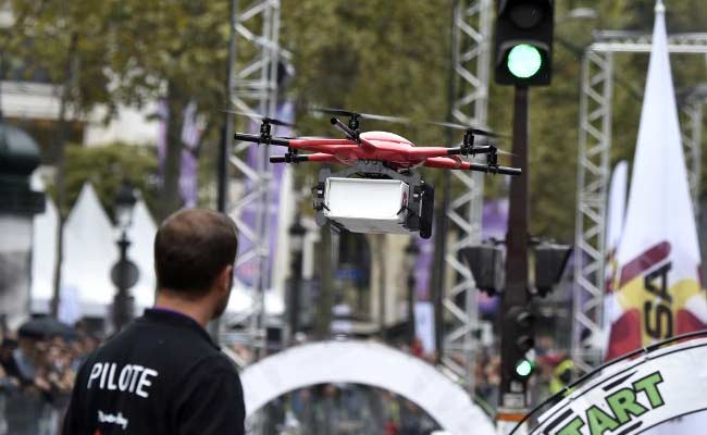 Drones Overfly Champs-Elysee In 'Magical' Paris Festival