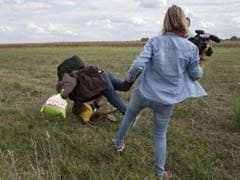 Hungary Charges Camerawoman Accused Of Tripping Fleeing Migrants