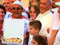 A Giant Pizza Lunch For The Homeless After Mother Teresa's Canonisation