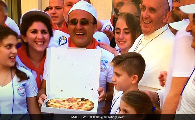 A Giant Pizza Lunch For The Homeless After Mother Teresa's Canonisation