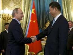 Xi, Putin Bromance Becomes Security Bond Amid U.S. Tensions