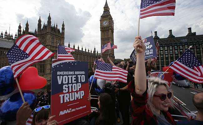 Anti-Trump Campaigners Hit London's Streets In Red Bus