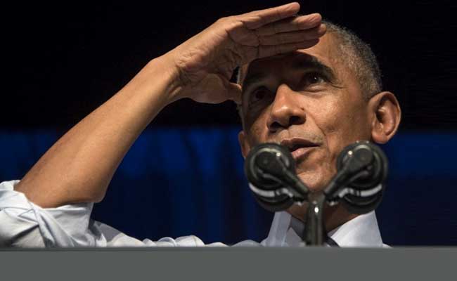 ओबामा ने प्रदर्शनकारी महिला से कहा, मैं बूढ़ा हो रहा हूं, सुन नहीं पा रहा, मुझे पत्र लिखकर बताएं