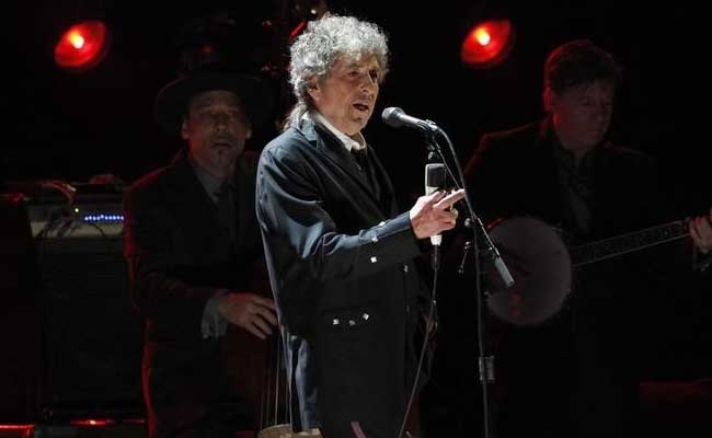 'Greatest Living Poet' Bob Dylan, Enigmatic Voice Of American Life