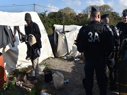 Calais 'Jungle' Empties As Demolition Crews Move In Calais 'Jungle' Empties As Demolition Crews Move In