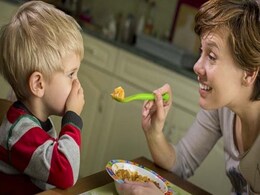 Getting a Little Kid to Behave (and Eat) at the Dinner Table? Make it a Game Getting a Little Kid to Behave (and Eat) at the Dinner Table? Make it a Game