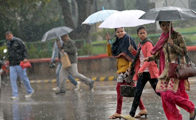 Delhi Rains Brings Temperature Down by 5 Notches
