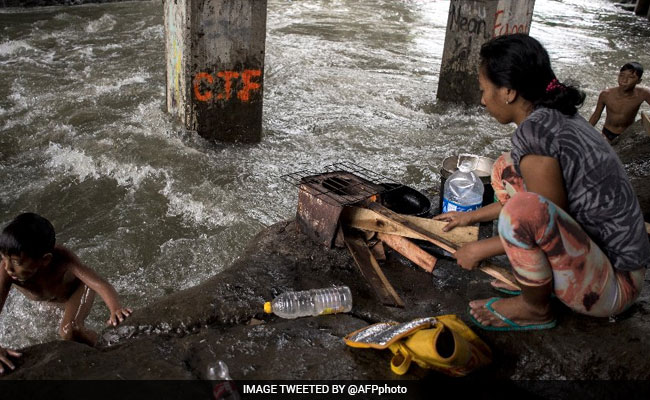 Over 90,000 People Flee As Typhoon Haima Slams Northern Philippines