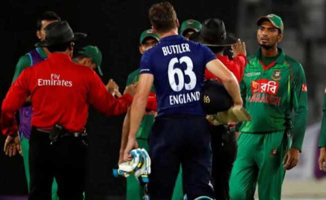 मीरपुर में दूसरे वनडे के दौरान बांग्&zwj;लादेशी टीम और इंग्&zwj;लैंड के कप्&zwj;तान बटलर के बीच विवाद...