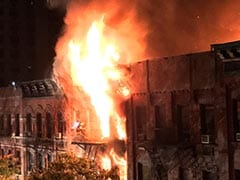 New York City Firefighter Stages Dramatic Rescue In Fatal Blaze