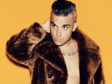 Robbie Williams 'Cannot Move' His Forehead After Chin Reduction Surgery