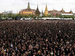 Massive Crowds Sing Royal Tribute To Late Thai King