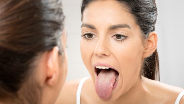 First Signs of Tongue Cancer? कैसे होते हैं जीभ के कैंसर के शुरुआती लक्षण? जानें टंग कैंसर के लक्षण, कारण, बचाव के उपाय और इलाज