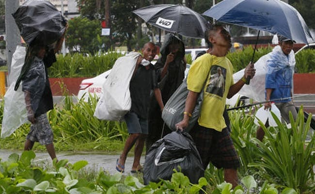 Floods Kill 24 In Vietnam As Typhoon Sarika Looms