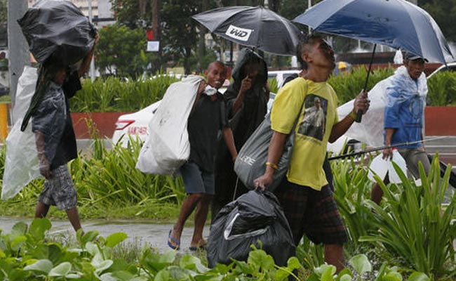 Floods Kill 24 In Vietnam As Typhoon Sarika Looms