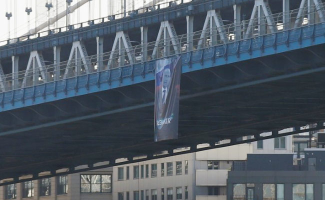 Banner Of Vladimir Putin Hung From New York City Bridge