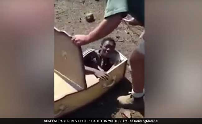 White South African Men Accused Of Forcing Black Man Into Coffin Denied Bail