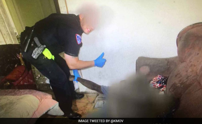 Mother Blasts Photo Of Officer Smiling, Giving Thumbs-Up Next To Her Son's Dead Body