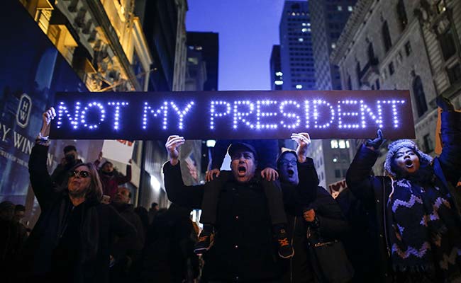 Thousands Rally, March In Nationwide Anti-Trump Protests