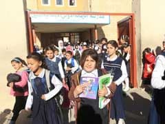 Iraqi Children Dump ISIS's Books Of Violence, Return To School