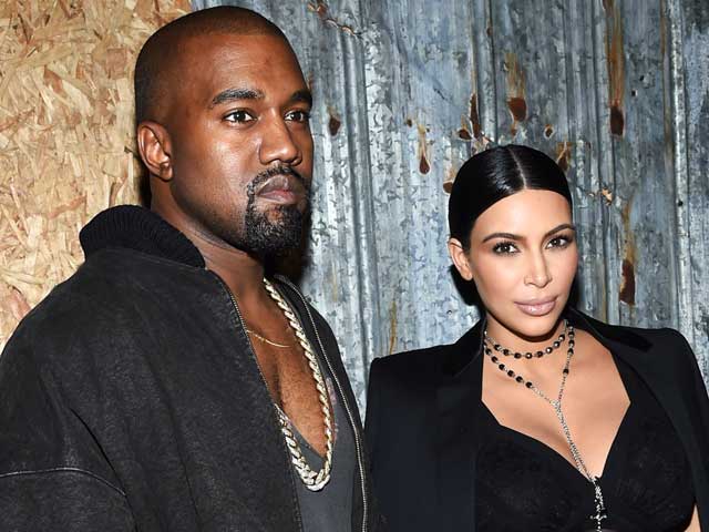 Kim Kardashian Shows Major Cleavage and Licks Kanye West's