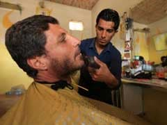 Shaves At Barber's, Corpses In Streets As ISIS Retreats In Mosul