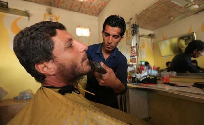 Shaves At Barber's, Corpses In Streets As ISIS Retreats In Mosul