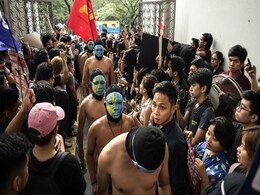 Nude Students, Filipino Activists Protest Dictator Ferdinand Marcos' Burial Nude Students, Filipino Activists Protest Dictator Ferdinand Marcos' Burial