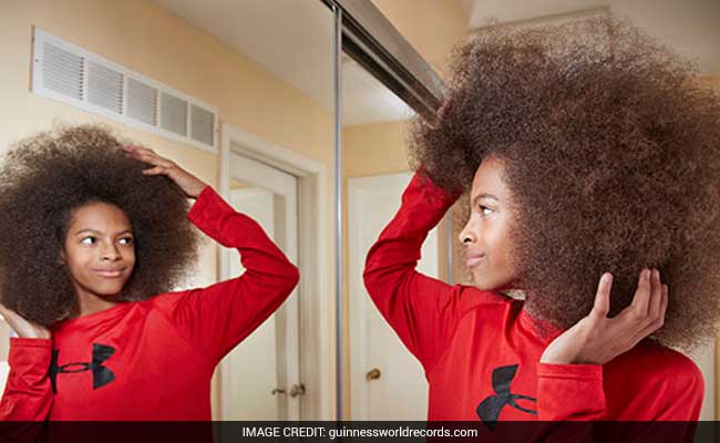 13 Year Old Boy With World S Largest Afro Sets Guinness Record