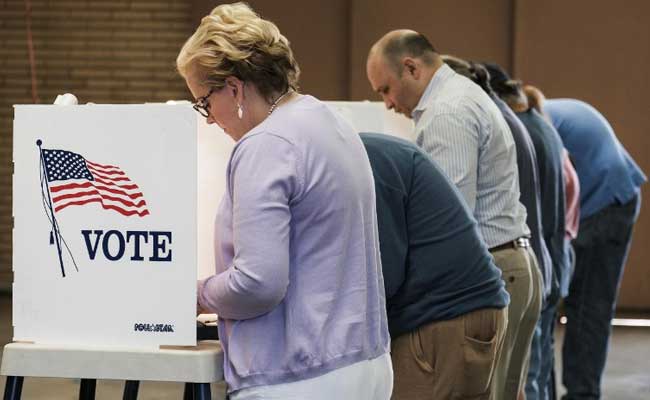 Americans Go To Polls To Cast Last Verdict On Clinton, Trump