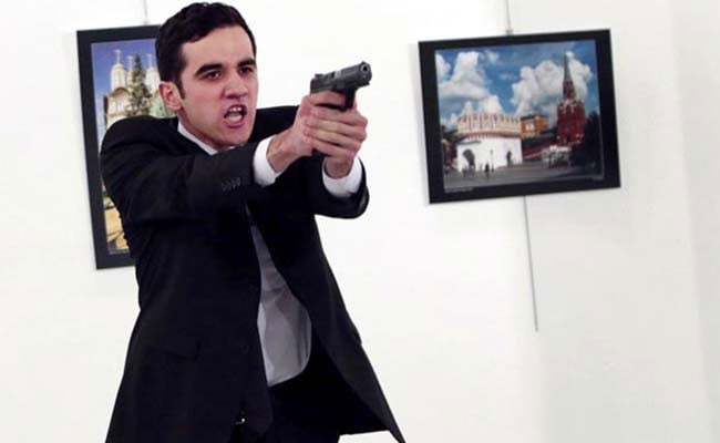 The Sharp-Suited Turkish Policeman Who Killed Russian Envoy