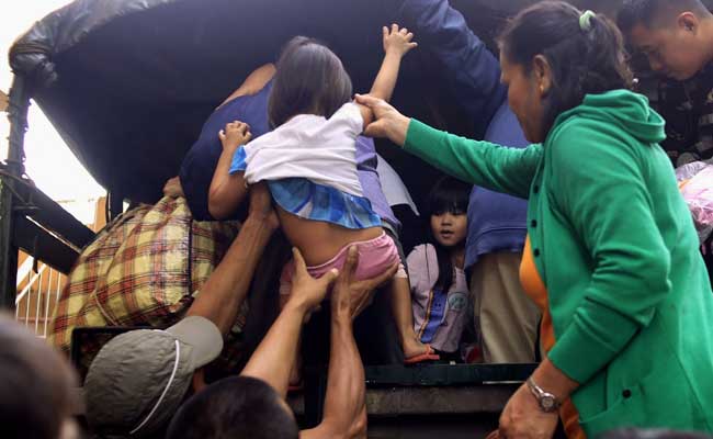 Tens Of Thousands Flee Christmas Day Typhoon In Philippines