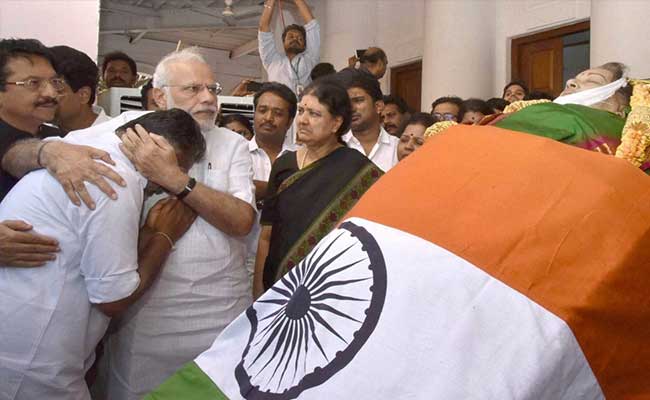 As PM Paid Tribute To Jayalalithaa, He Hugged Chief Minister Panneerselvam To Console Him