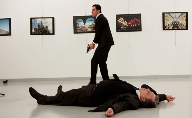 Killer Of Russian Envoy 'Used Police ID' To Enter Ankara Show