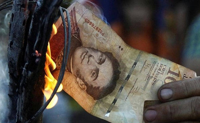 Hundreds Arrested In Venezuela Cash Chaos, Vigilantes Protect Shops