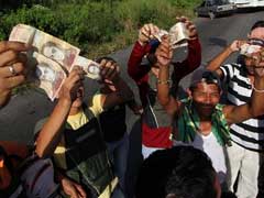 Venezuela Cash Crisis Sparks Looting, Protests