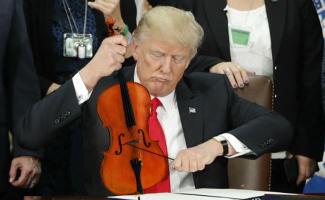 Donald Trump's Pic Of Capping A Pen Prompts Hilarious Photoshop Battle