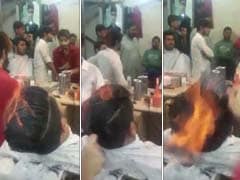 Gulp. Pakistani Stylist Gives Clients Smoking Haircuts Using Fire