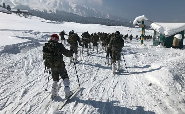 Snow-Covered Gulmarg Buzzing With Tourists Gliding Down Ice