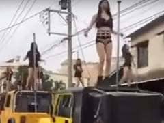 Pole Dancers Block Traffic At Taiwan Politician's Funeral