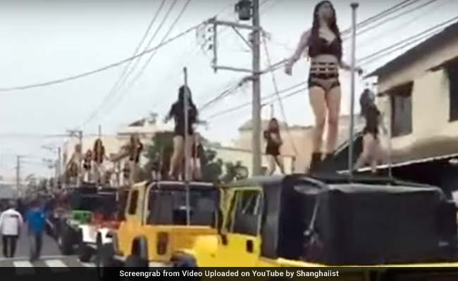 Pole Dancers Block Traffic At Taiwan Politician's Funeral