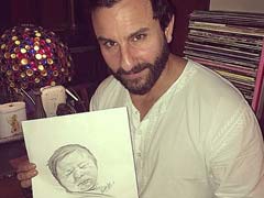 Saif Ali Khan Poses With A Sketch Of Baby Taimur